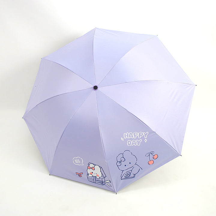 Damefoldingparaply med leken design og munter Luvikno motiv