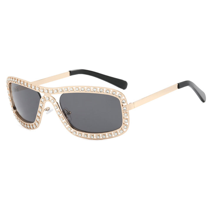 Dame moteriktig solbrille med glitrende ramme Luvikno