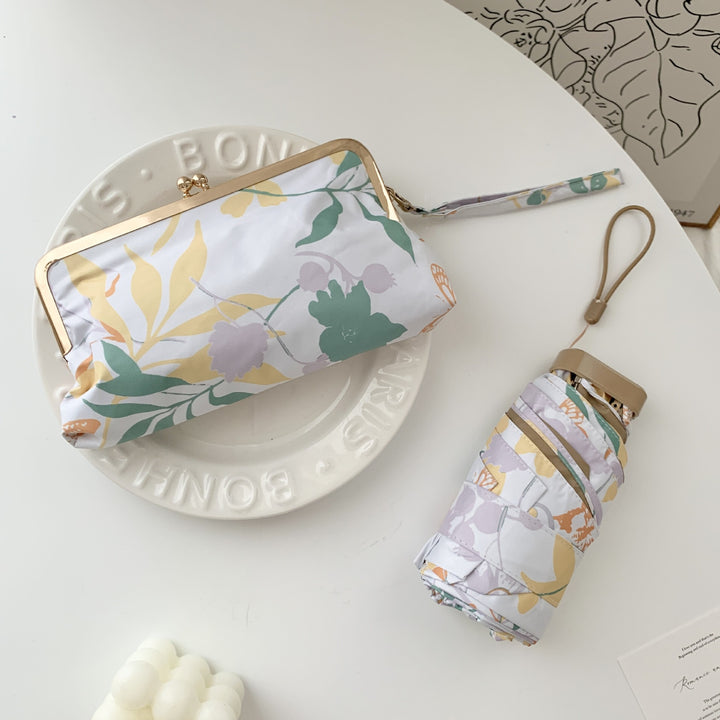 Damer elegant foldeparaply med blomsterdesign og praktisk etui Luvikno