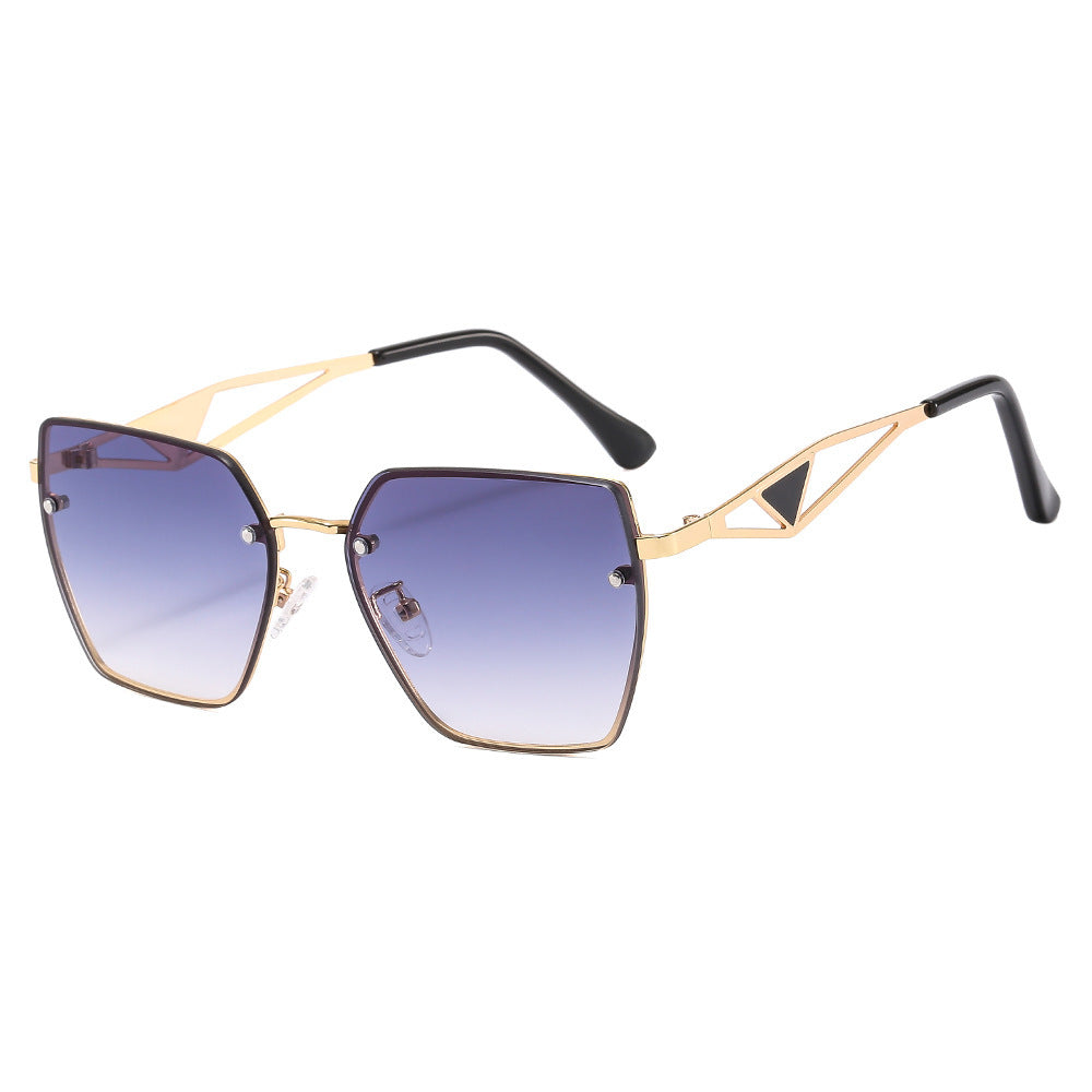 Dame geometrisk solbrille med filigran design Luvikno