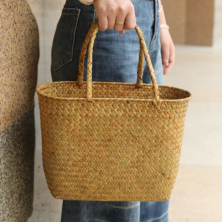 Unisex handlebag laget av flettet naturmateriale Luvikno