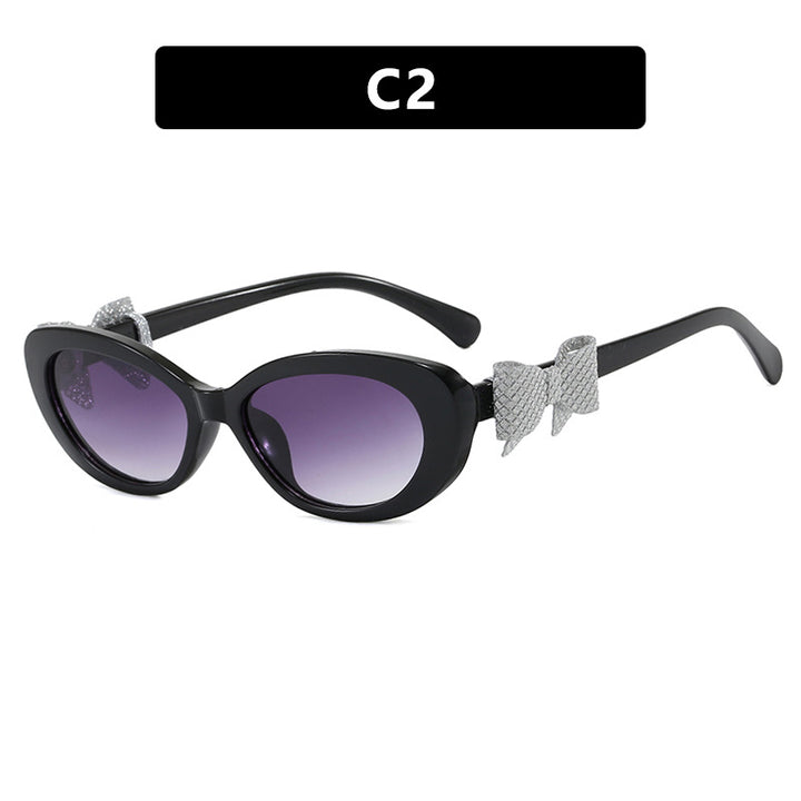 Dame moteriktig solbrille med lekent sløyfedesign Luvikno
