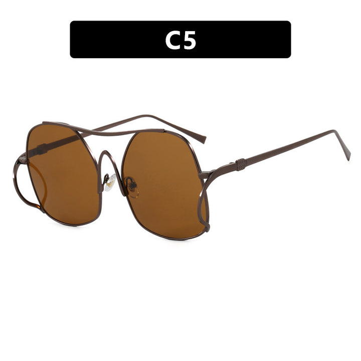 Dame geometrisk solbrille med smal metallramme og brune glass Luvikno