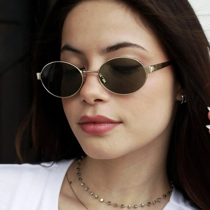 Dame rund brille med elegant metallramme og justerbare nesepads Luvikno
