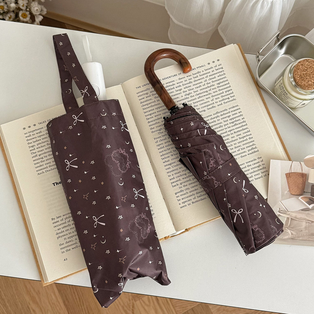 Dame sammenleggbart regnparaply med elegant anhengdesign Luvikno