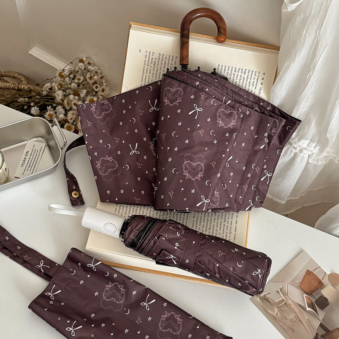Dame sammenleggbart regnparaply med elegant anhengdesign Luvikno