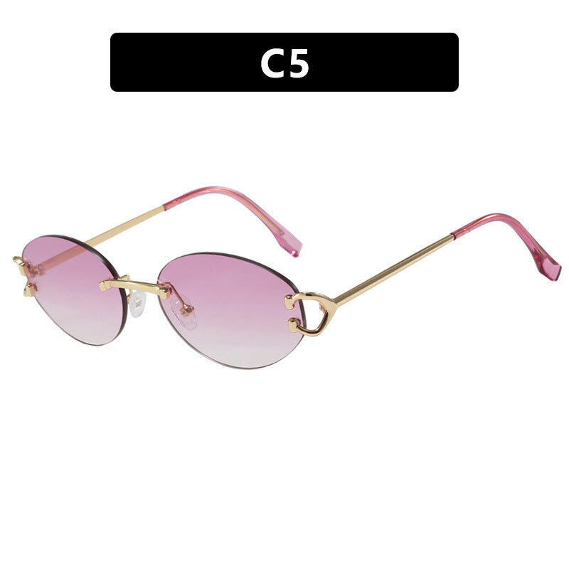 Dame elegant ovalformet solbrille med moderne metalramme Luvikno
