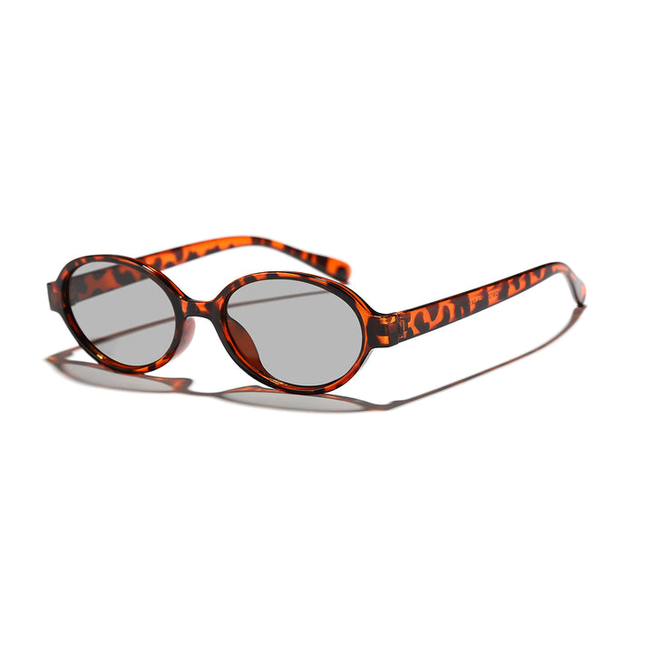 Dame moterik oval solbrille med dyremønster Luvikno