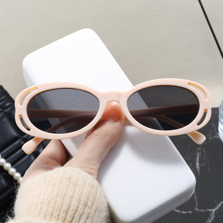 Damen modische solbrille med oval ramme og unikt design Luvikno