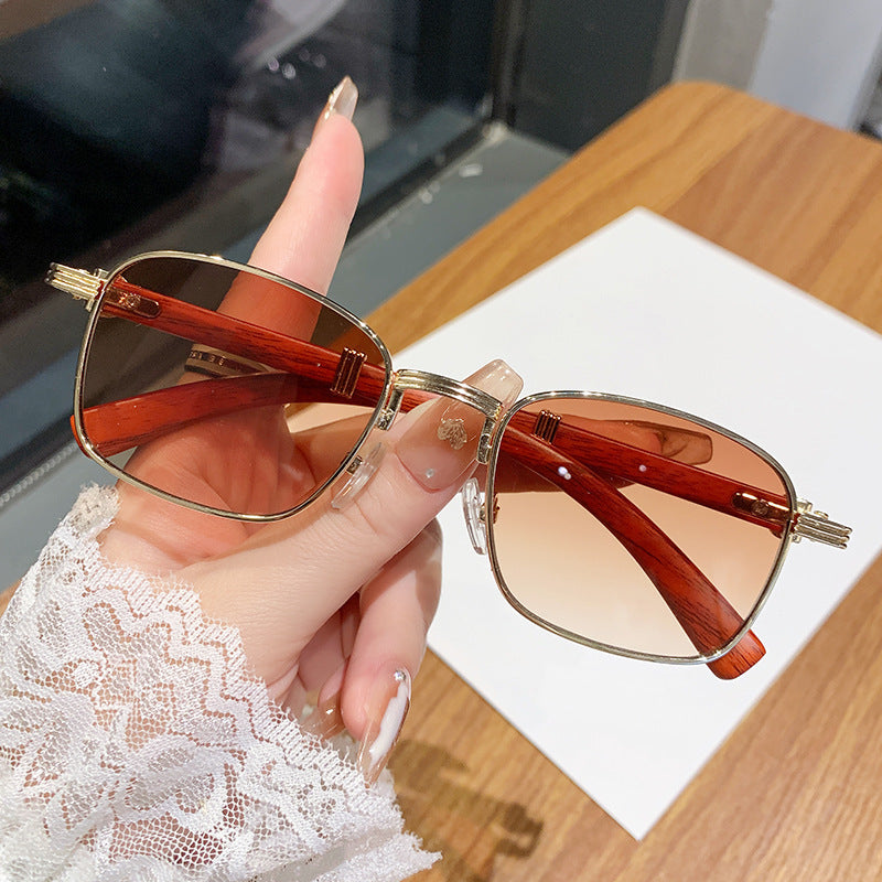 Dame solbrille med luksuriøs treinnfatning Luvikno