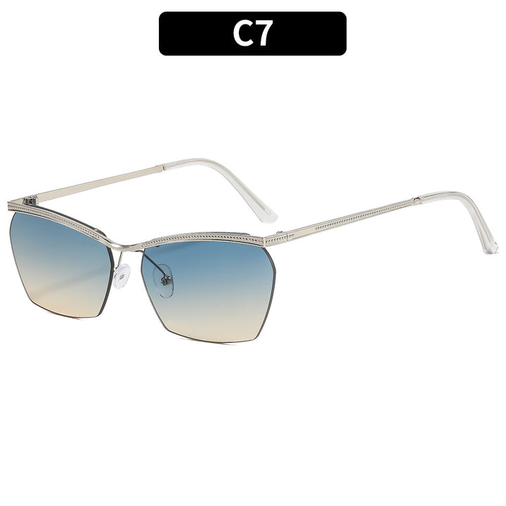 Dame moterik solbrille med filigran ramme og myk fargegradient Luvikno