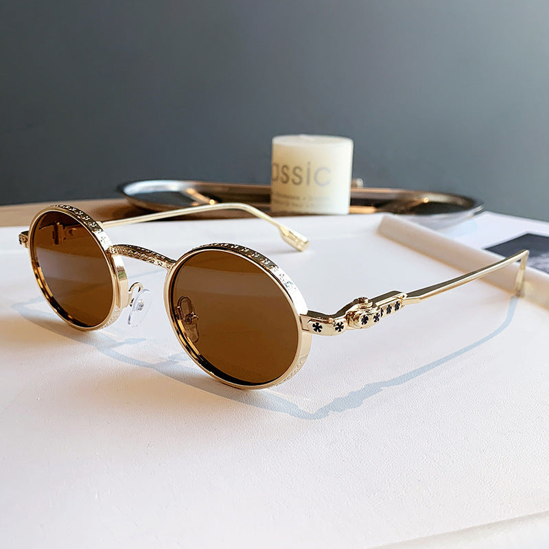 Dame Elegant solbrille med filigran detaljer Luvikno