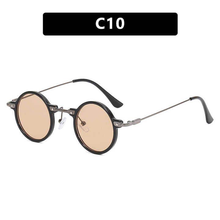 Dame rund solbrille med moderne metallramme og store blå linser Luvikno