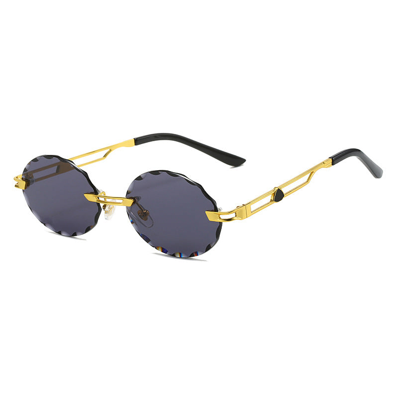 Dame rund solbrille med unikt bølgedesign og høykvalitets metallramme Luvikno