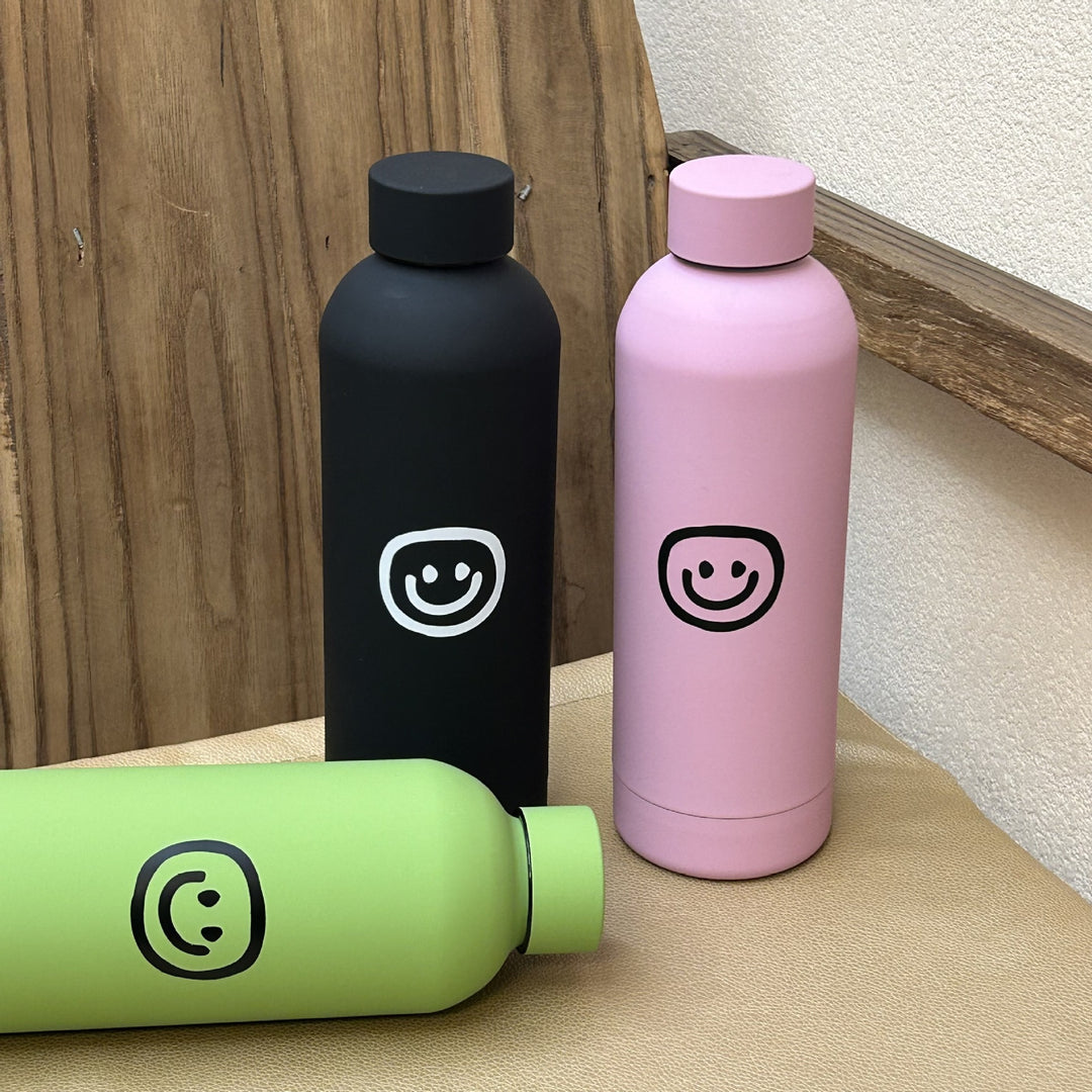 Dame isolasjonsflaske med glad smiley-design Luvikno