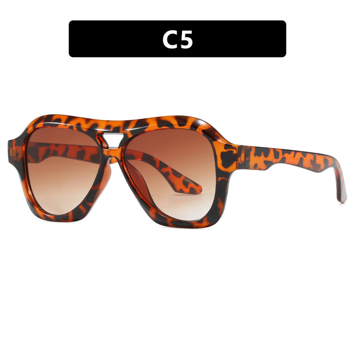 Dame moterik solbrille i innovativ design med bred ramme Luvikno