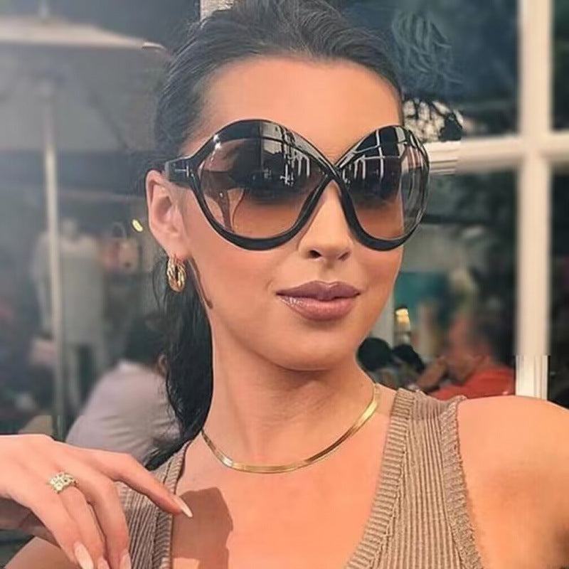 Dame ekstravagant formet solbrille Luvikno