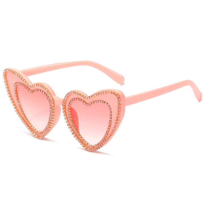 Dame hjerteformet solbrille med glitrende detaljer Luvikno