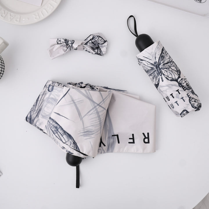 Dame fashionable foldeparaply med leken design Luvikno