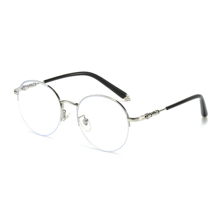 Dame rund solbrille med elegant metallramme og komfortable nesepads Luvikno