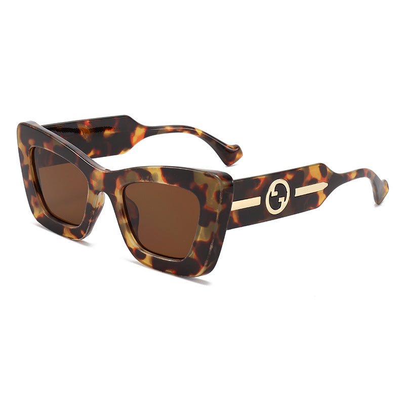 Dame designer solbrille med markant geometrisk ramme og høy kvalitet utførelse Luvikno
