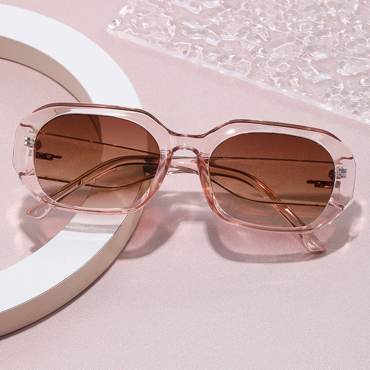 Dame moteriktig geometrisk solbrille med robust design Luvikno