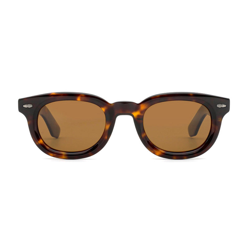 Dame retro-inspirert solbrille med bredt skilpadde-ramme og harmoniske glass Luvikno