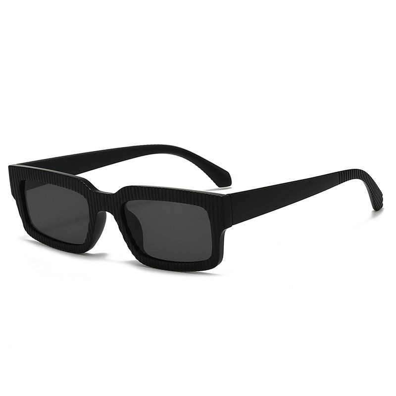 Dame moteriktig solbrille med geometrisk ramme Luvikno