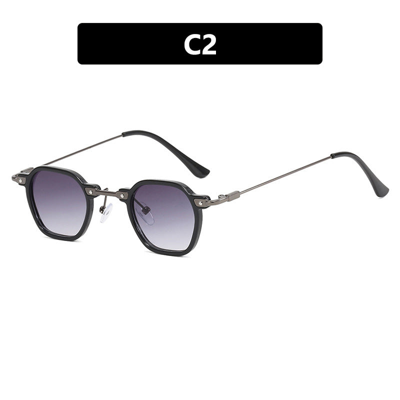 Dame moteriktig solbrille i elegant design med sekskantet ramme Luvikno