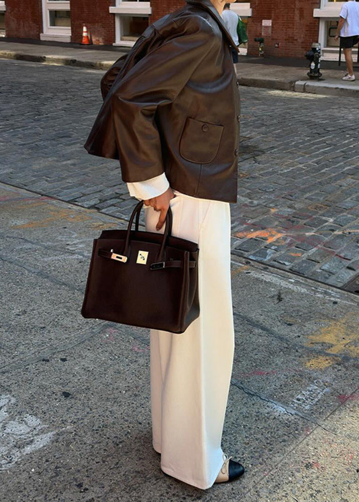 Luvik | Lyhennetty nappikaulus keinonahkatakki