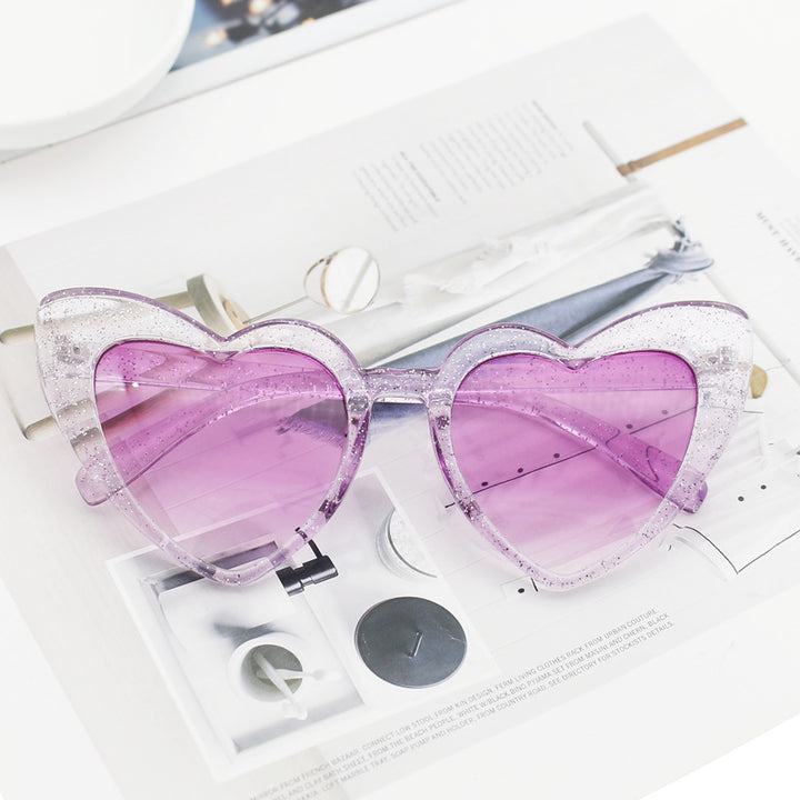 Dame hjerteformet solbrille med glitrende ramme Luvikno