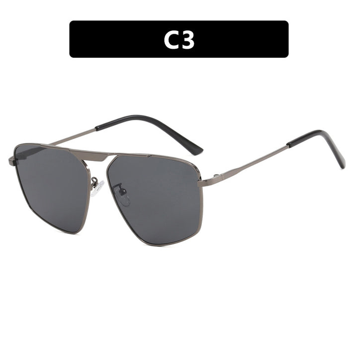 Dame solbrille i moderne, geometrisk design med robust metallramme Luvikno