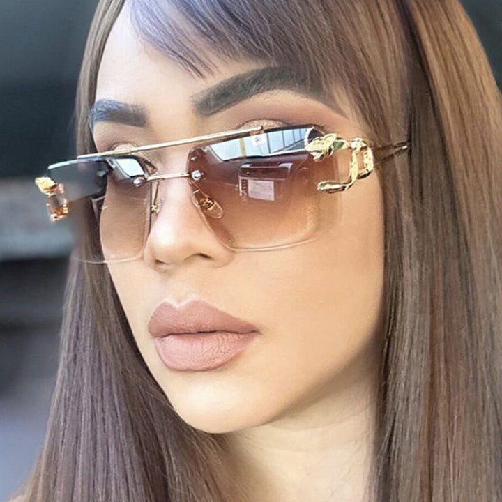 Dame kvadratisk solbrille med elegante dekorative detaljer Luvikno