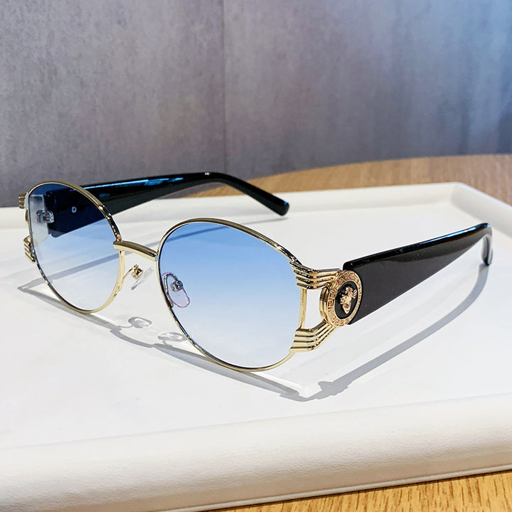Dame elegant solbrille med luksuriøs metallramme og speilte glass Luvikno
