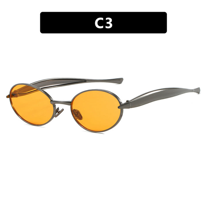 Dame moteriktig solbrille med oval ramme og glitrende detaljer Luvikno