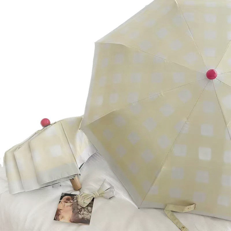 Dame sammenleggbart paraply med spesiell design Luvikno