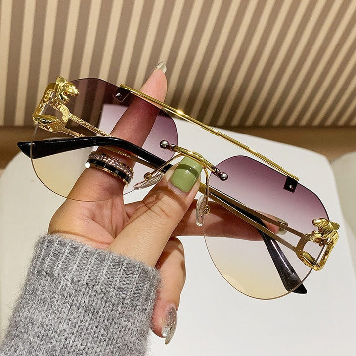 Dame Designer solbrille med unikt dyreakcent Luvikno
