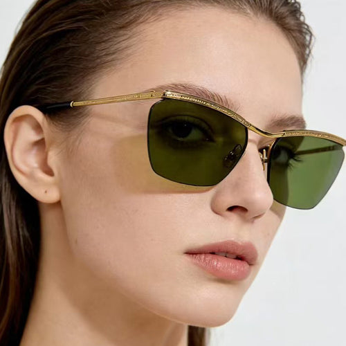 Dame moterik solbrille med filigran ramme og myk fargegradient Luvikno