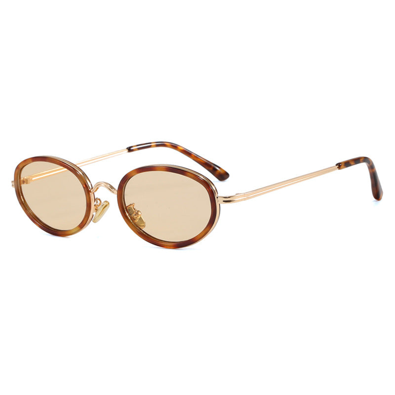 Dame elegant rund solbrille med moderne metallramme Luvikno