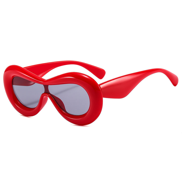Dame moteriktig solbrille med nostalgisk sving Luvikno