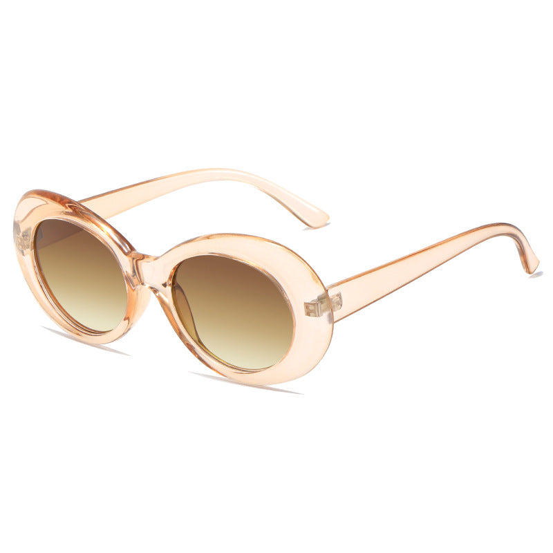 Dame retro-inspirerte solbriller med en elegant, oval ramme Luvikno
