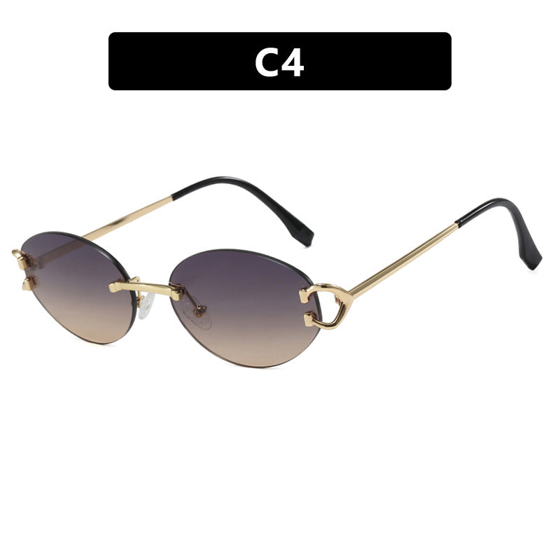 Dame elegant ovalformet solbrille med moderne metalramme Luvikno