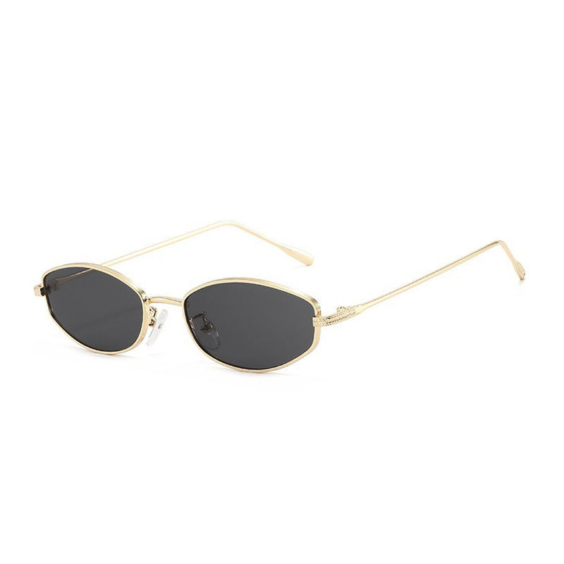 Dame moteriktig solbrille i minimalistisk ovalt design Luvikno