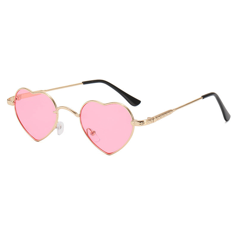 Damer hjerteformet solbrille med filigran metallramme Luvikno