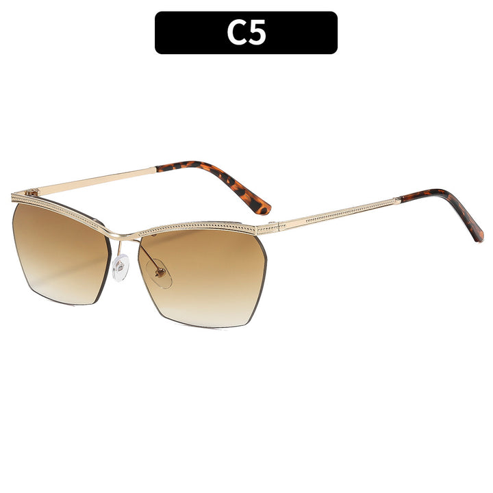 Dame moterik solbrille med filigran ramme og myk fargegradient Luvikno