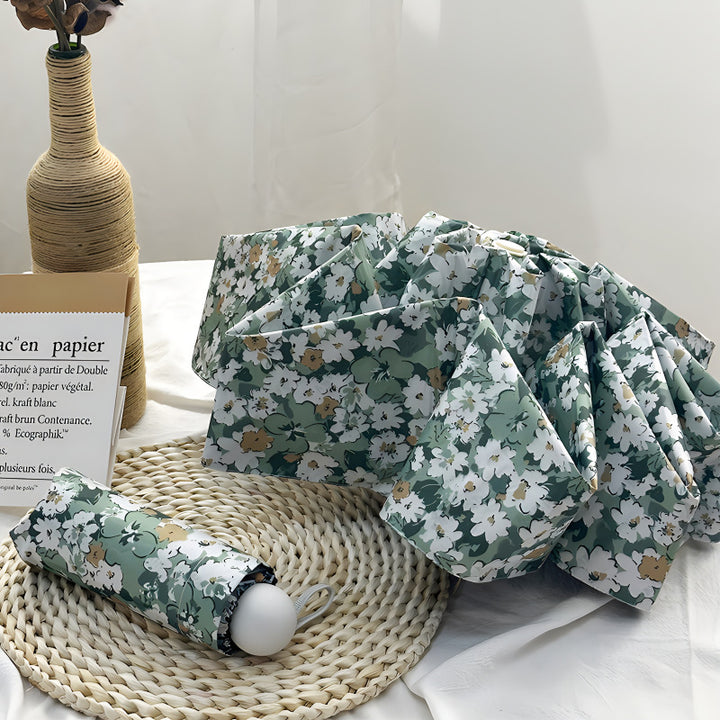 Damer Sammenleggbart paraply med elegant blomsterdesign Luvikno