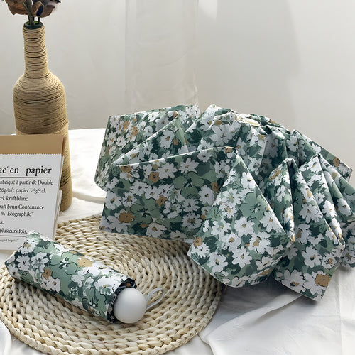 Damer Sammenleggbart paraply med elegant blomsterdesign Luvikno