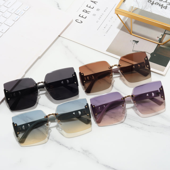 Damer Høyverdig rektangulær solbrille med stilfull metallramme Luvikno
