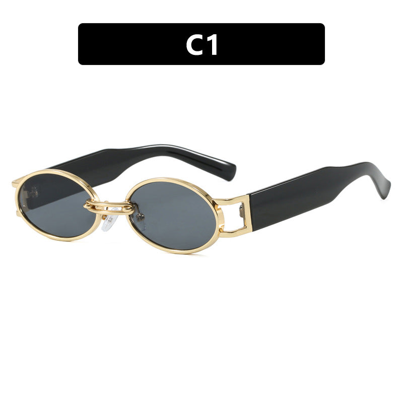 Dame ovalformet solbrille med gullige accenter og stilig ramme Luvikno