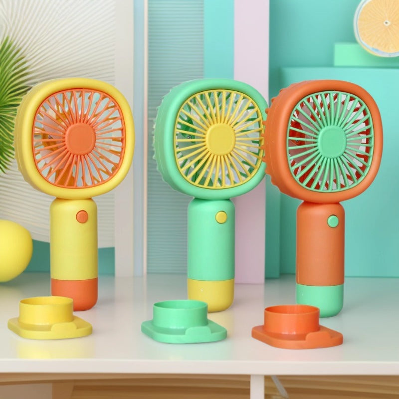 Unisex Håndholdt Vifte med ergonomisk design og praktisk ståfunksjon Luvikno